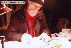 FIUWAC Side Illustration 097-1999 Jacobus Kloppenburg at work at his desk, FIU office,  Photo Waldo Bien 